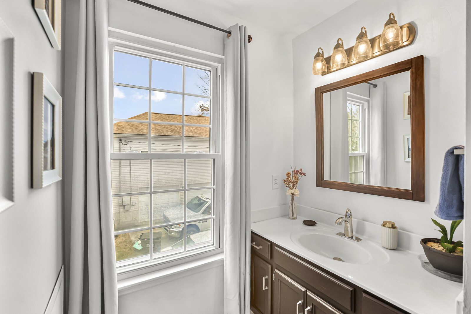 119 Pine Grove Road Mount Juliet, TN 37122 - Photo 26 of 37 a bathroom with a sink a vanity and a window