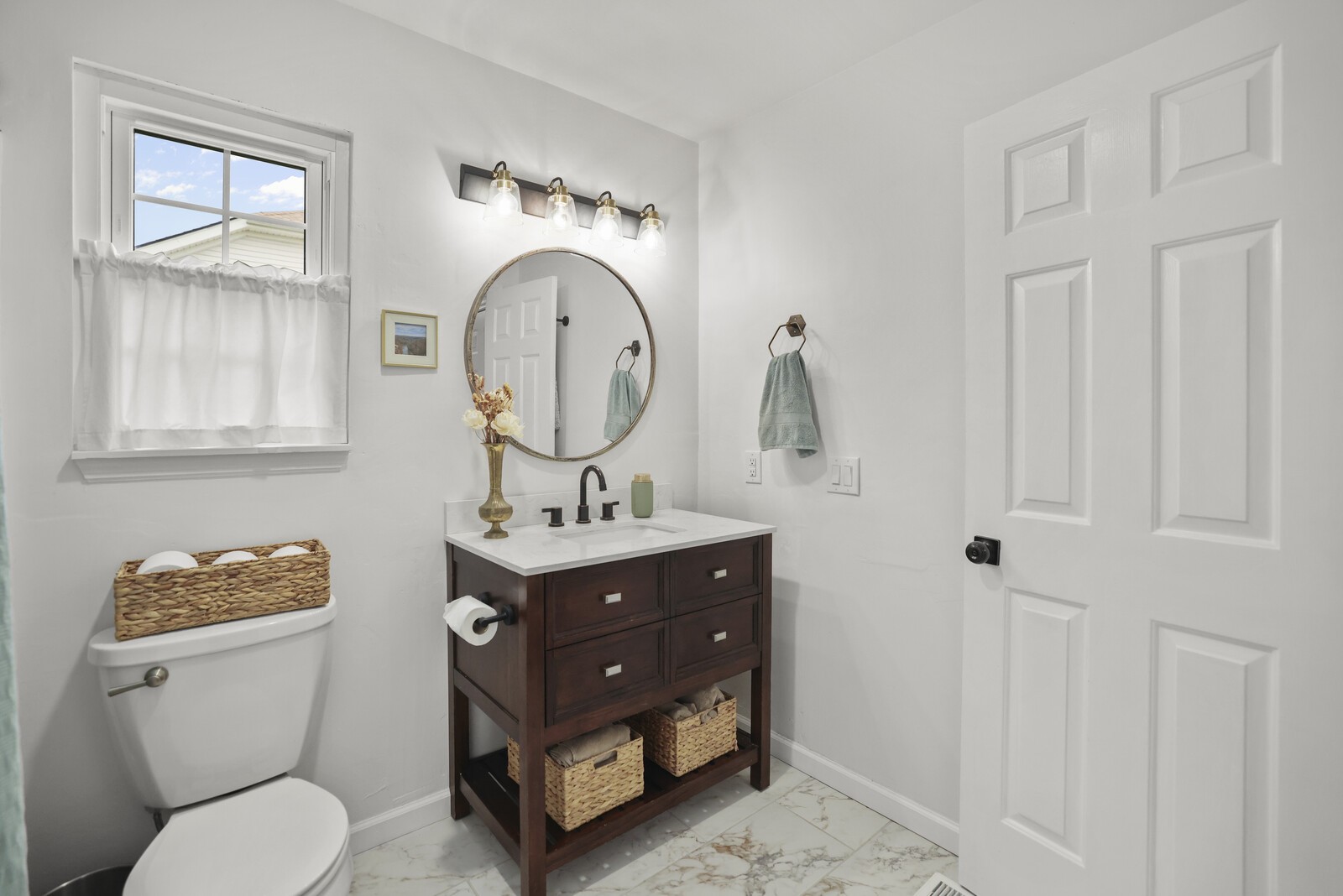 119 Pine Grove Road Mount Juliet, TN 37122 - Photo 3 of 37 a bathroom with a toilet sink and mirror