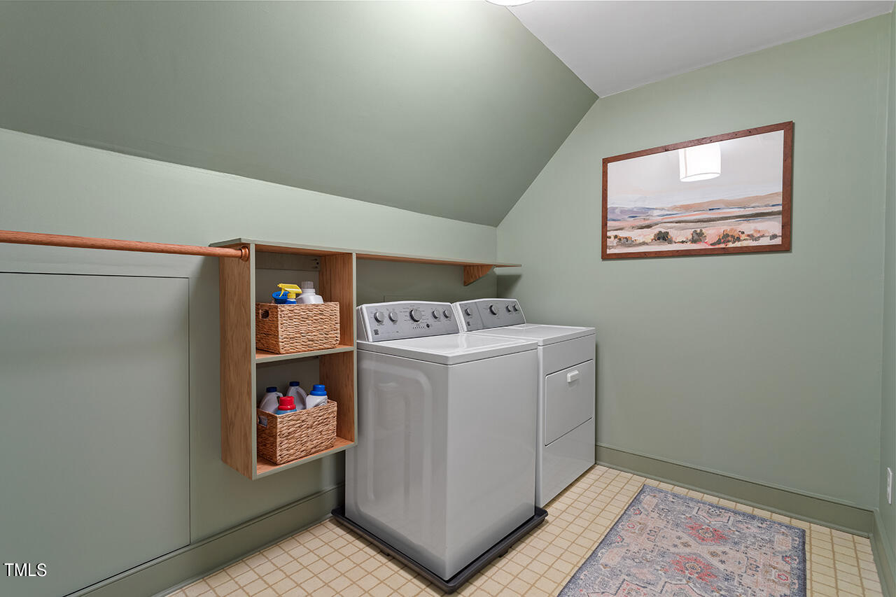 6933 Sandringham Drive Raleigh, NC 27613 - Photo 23 of 30 a utility room with dryer and washer