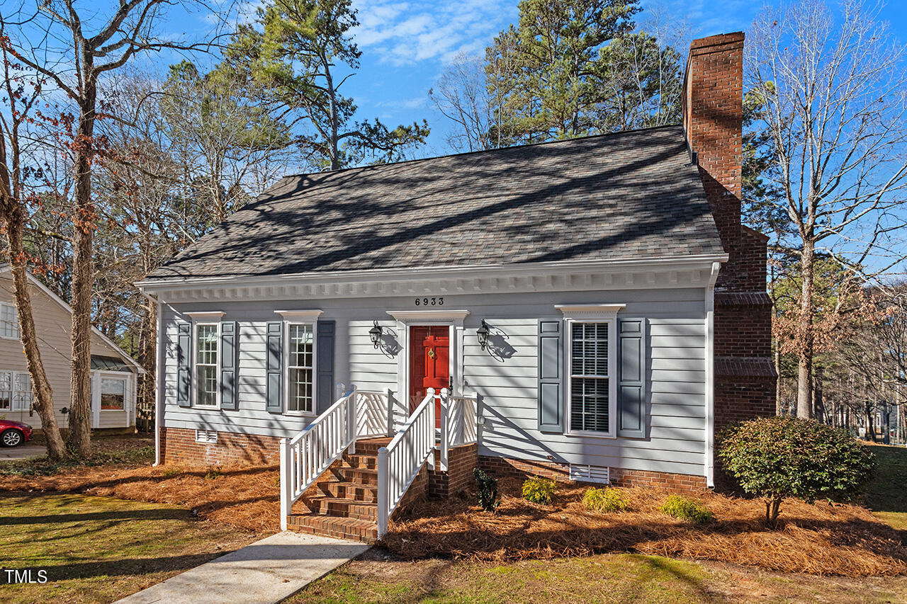 6933 Sandringham Drive Raleigh, NC 27613 - Photo 3 of 30 a front view of a house