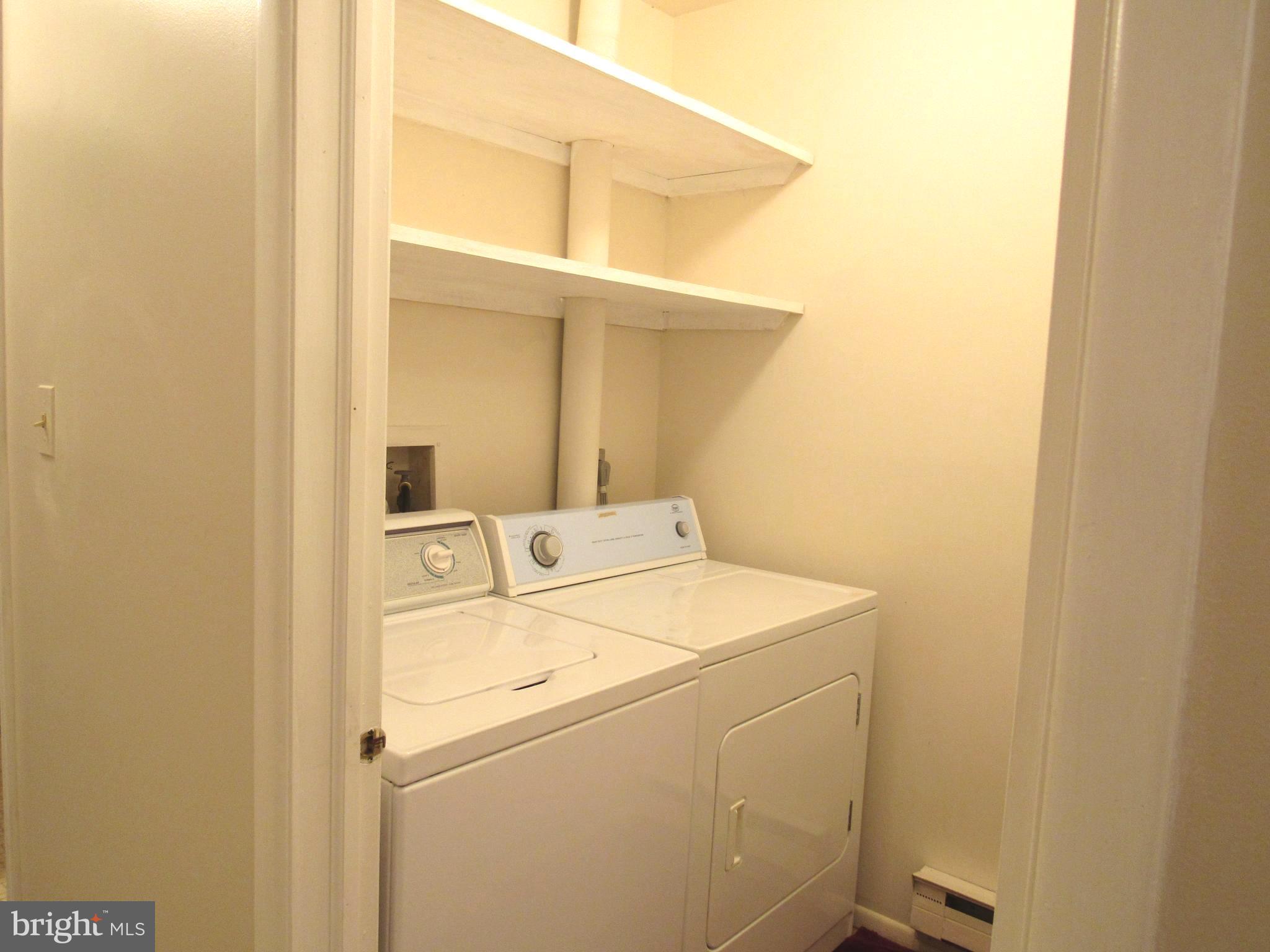 7008 Basswood Road Frederick, MD 21703 - Photo 14 of 26 a utility room with dryer and washer