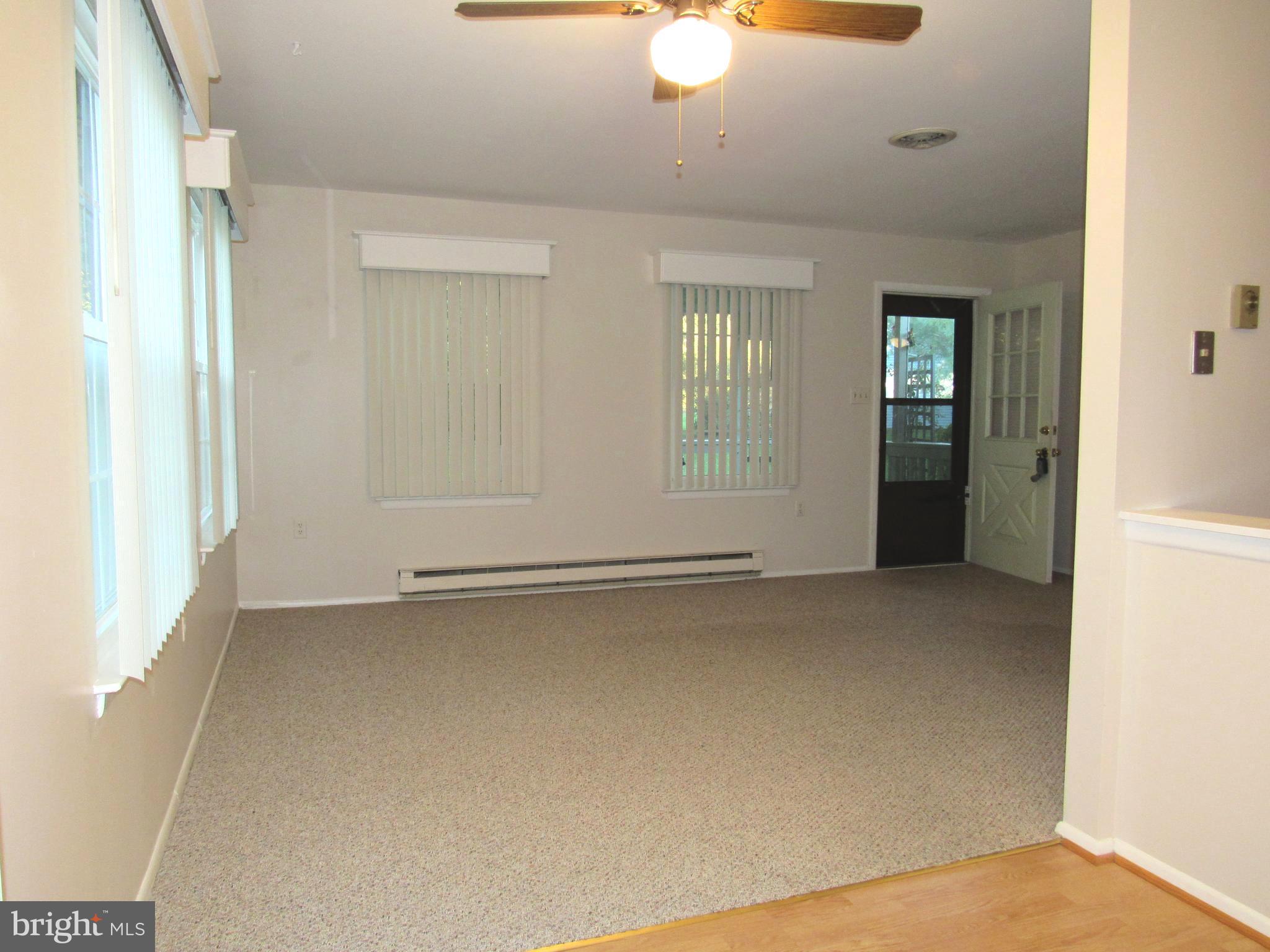 7008 Basswood Road Frederick, MD 21703 - Photo 8 of 26 an empty room with a empty space