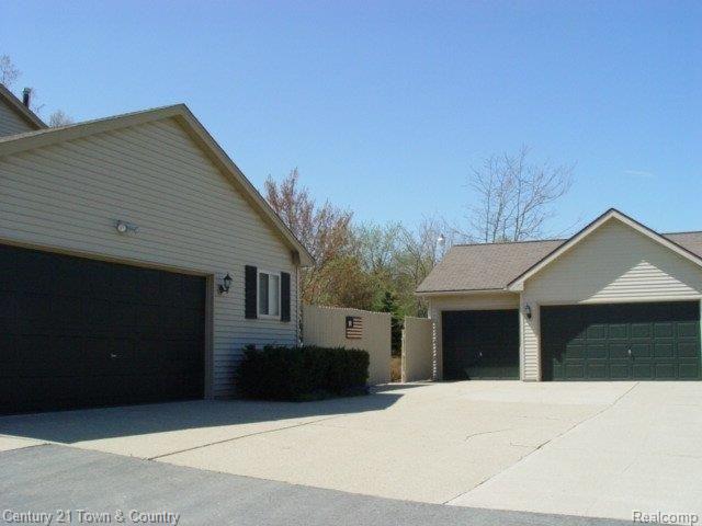 9385 North Eston Road Clarkston, MI 48348 - Photo 3 of 24 ATTACHED & 2ND GAR - 5-CAR TOTAL
