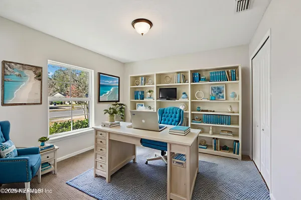 a room with furniture and a window