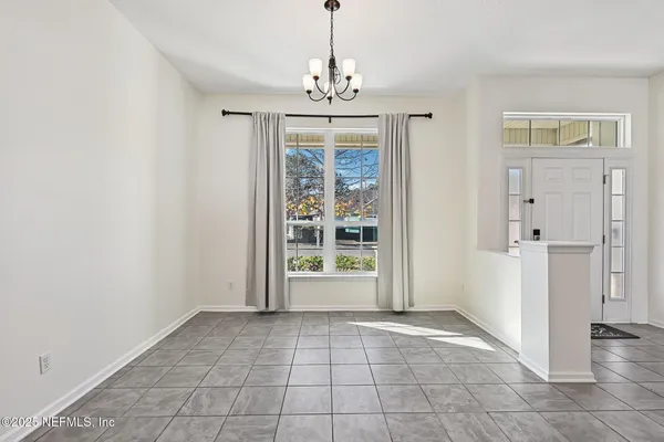 a view of an empty room with window