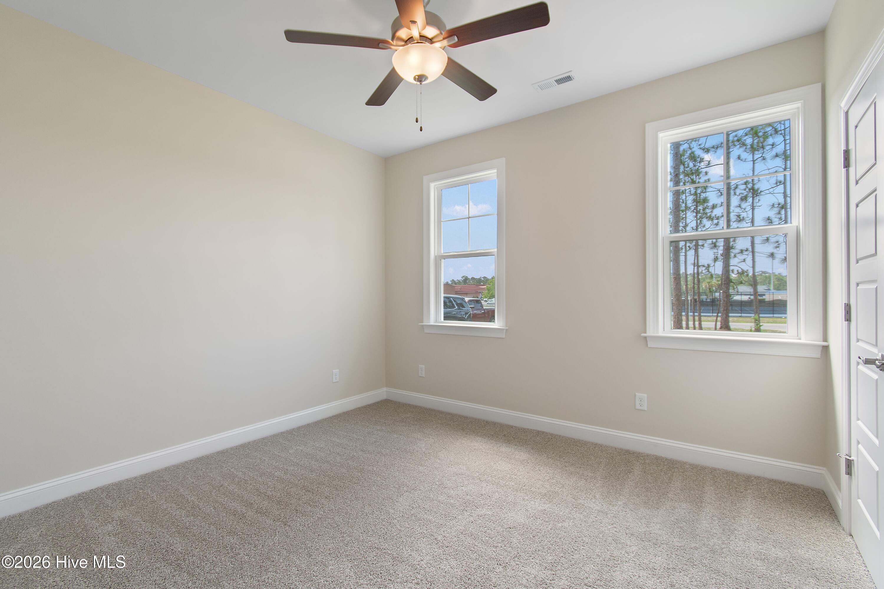 261 Cougar Road Southport, NC 28461 - Photo 28 of 72 Bedroom 2 - front
