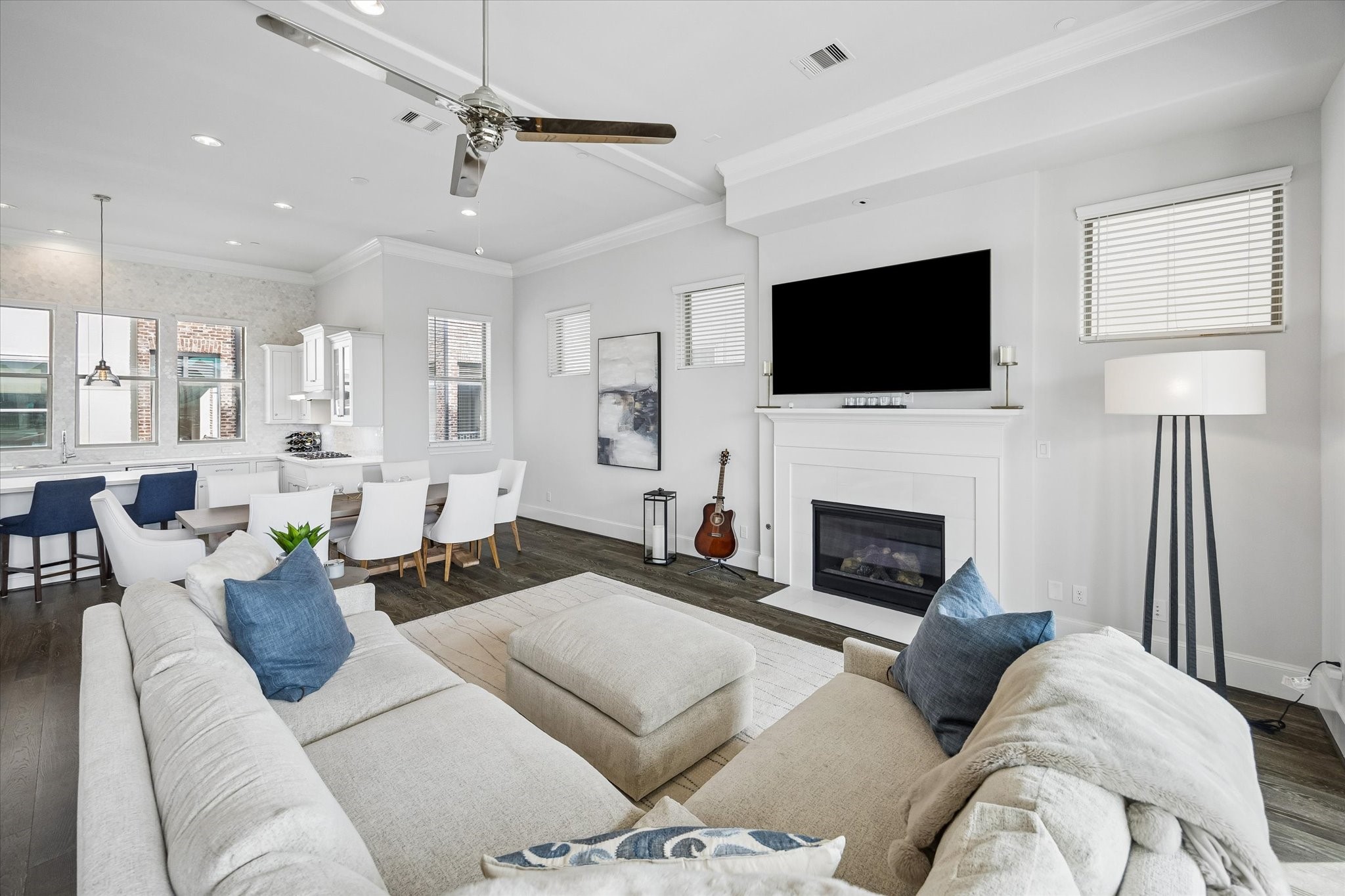 2727 Maxroy Street Houston, TX 77007 - Photo 11 of 46 a living room with furniture a fireplace and a flat screen tv