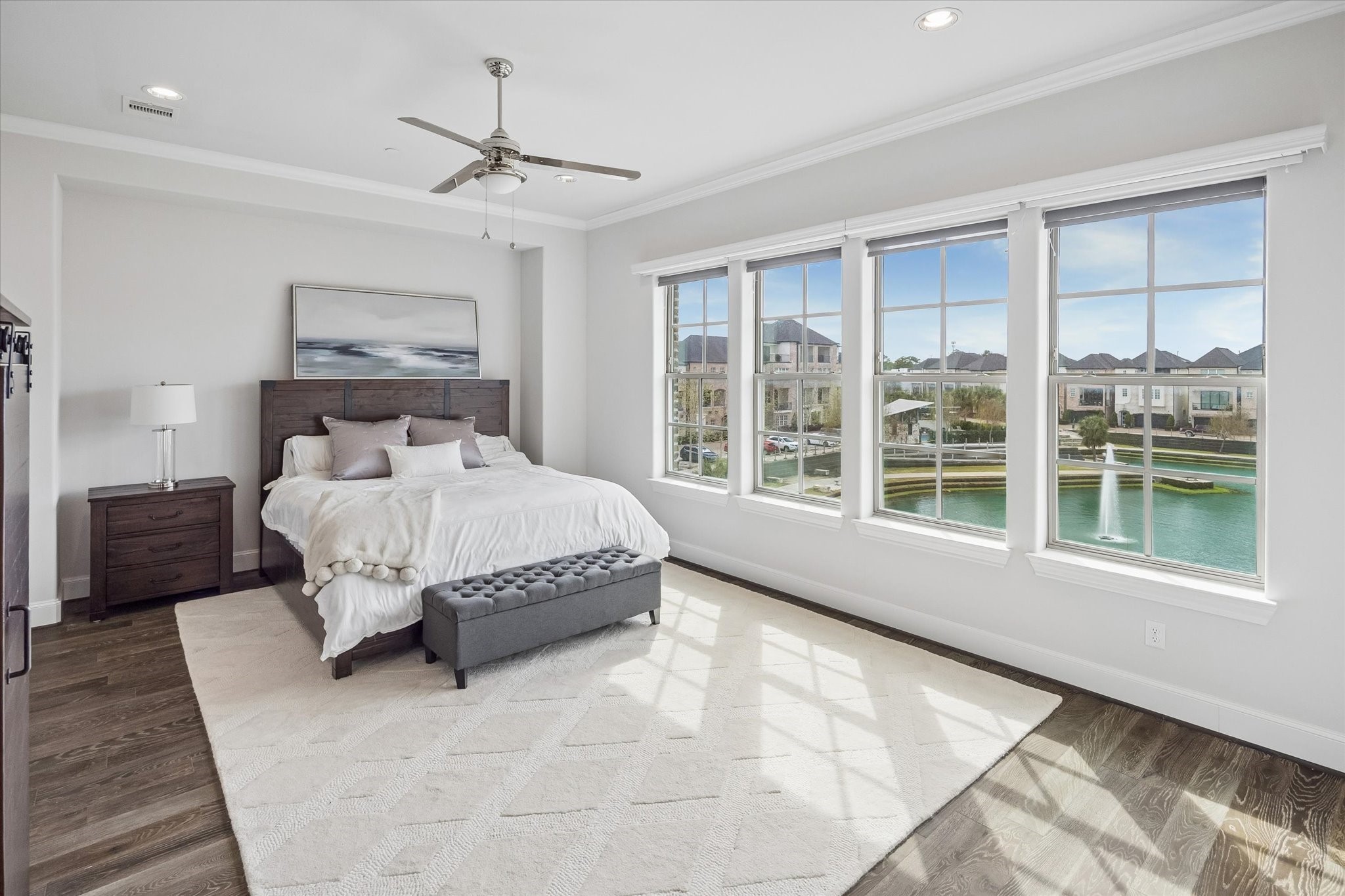 2727 Maxroy Street Houston, TX 77007 - Photo 20 of 46 a spacious bedroom with a large bed and a large window