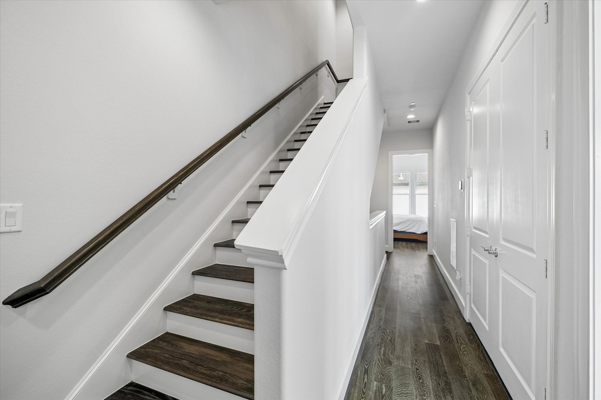 2727 Maxroy Street Houston, TX 77007 - Photo 37 of 46 a view of a hallway with wooden floor and entryway