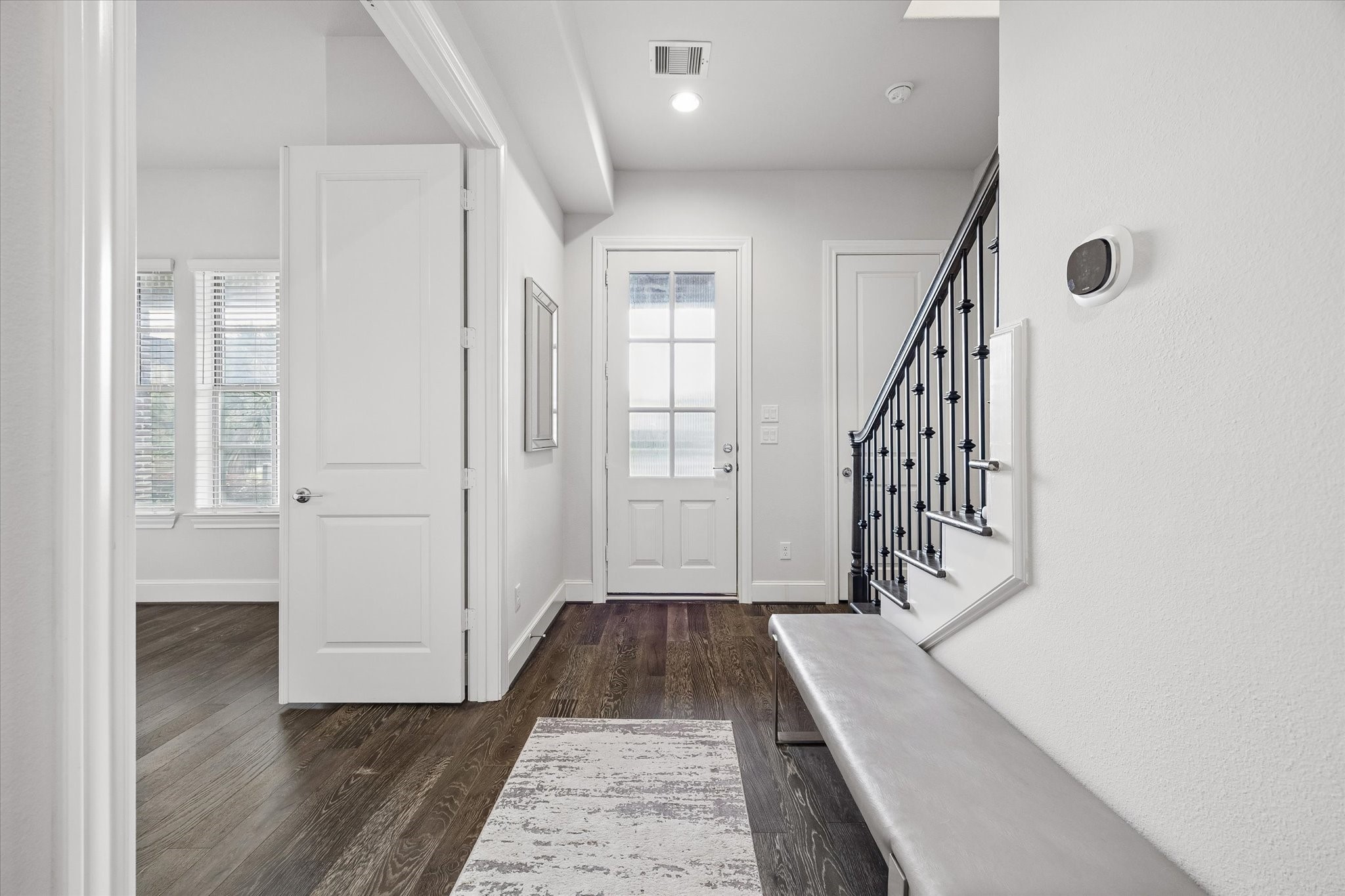 2727 Maxroy Street Houston, TX 77007 - Photo 7 of 46 View of front door on first-floor entry.