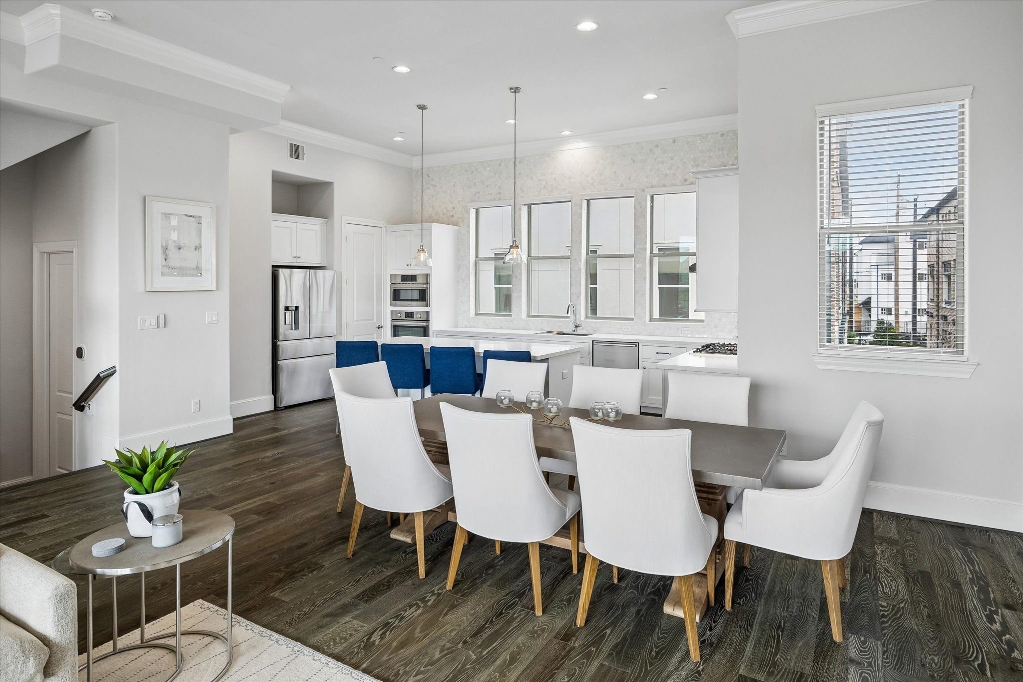 2727 Maxroy Street Houston, TX 77007 - Photo 8 of 46 a view of a dining room with furniture window and wooden floor