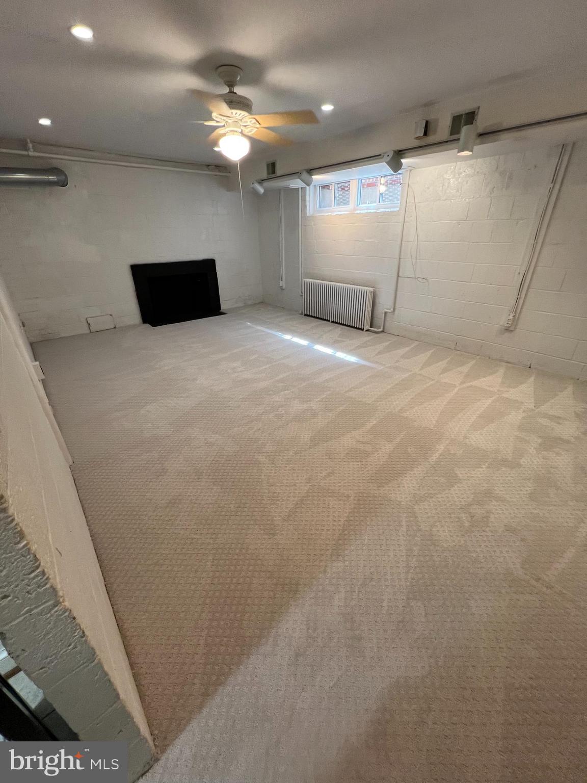 3636 Appleton Street Northwest Washington, DC 20008 - Photo 36 of 48 Newly carpeted family room/gym