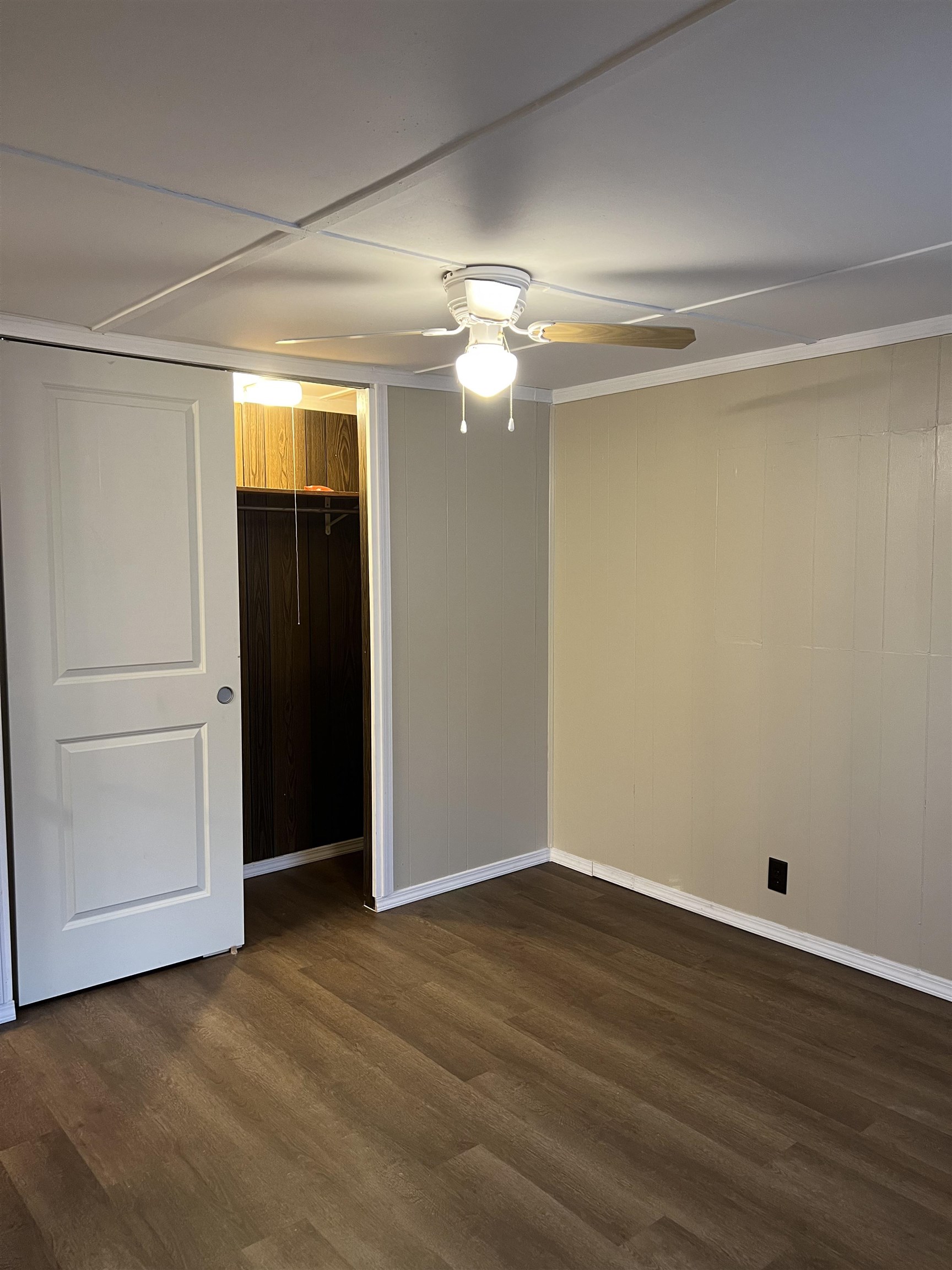 2107 Rivington Road Loves Park, IL 61111 - Photo 11 of 18 a view of an empty room with wooden floor