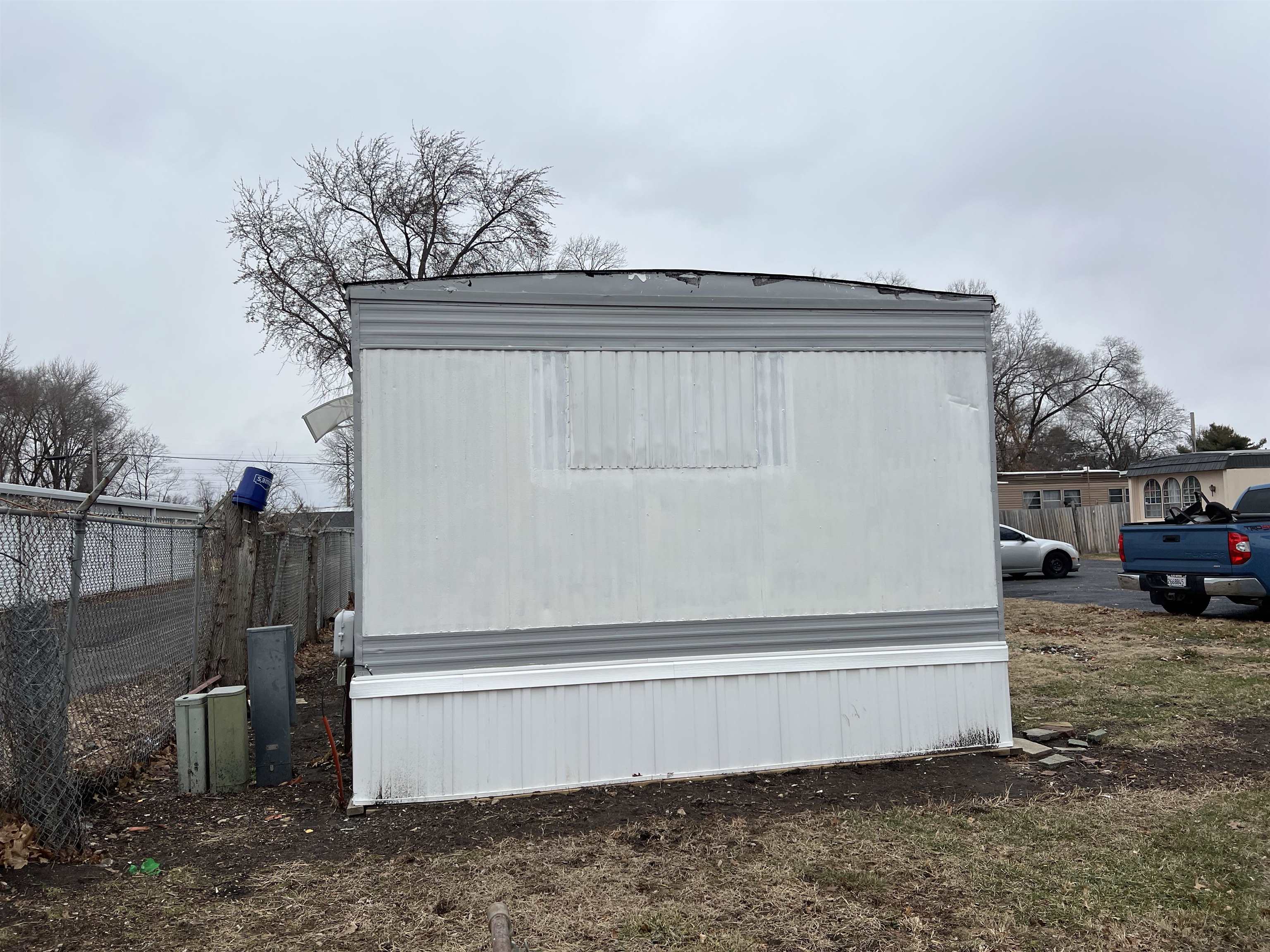 2107 Rivington Road Loves Park, IL 61111 - Photo 18 of 18 a view of backyard with parked car