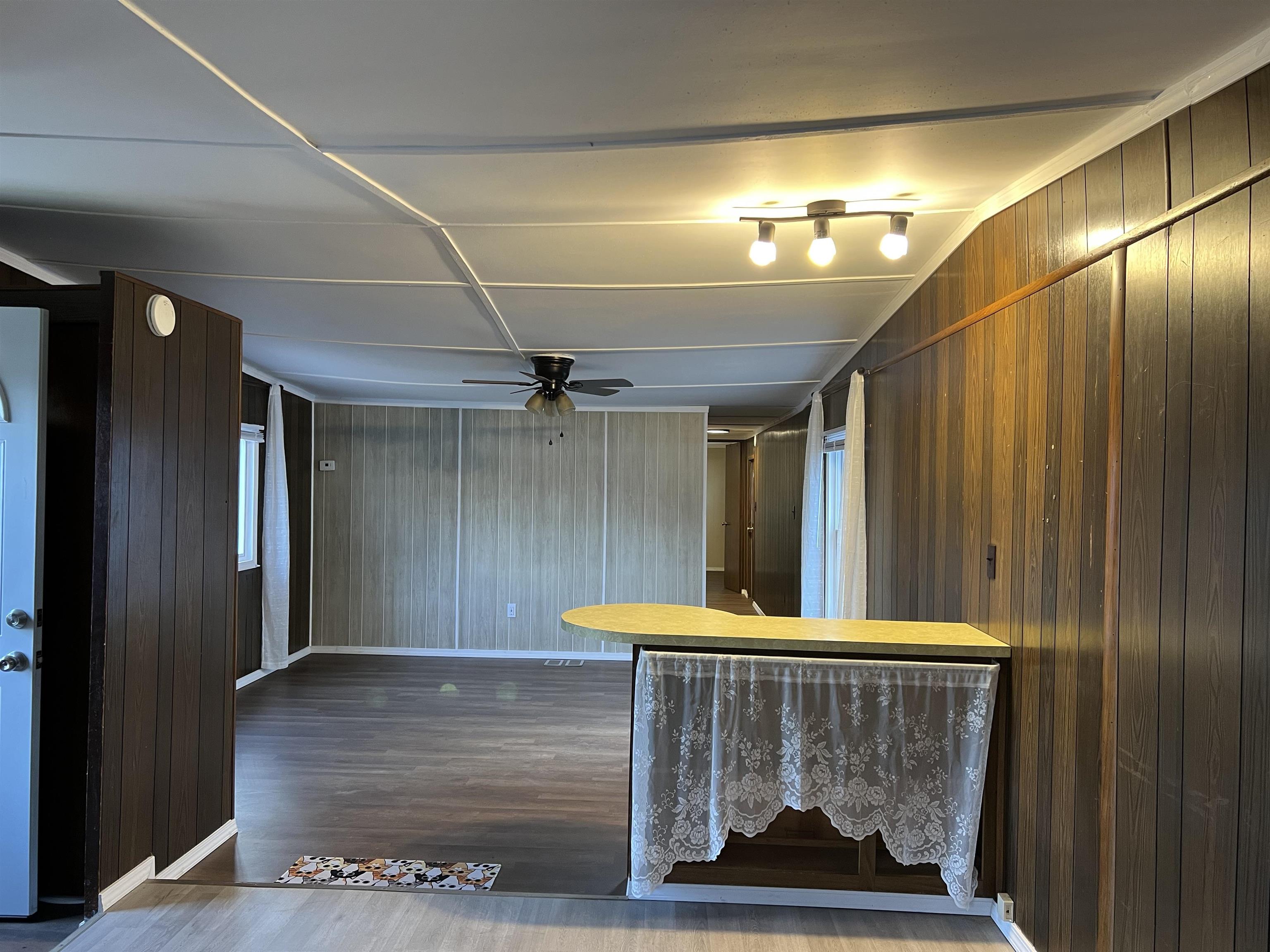 2107 Rivington Road Loves Park, IL 61111 - Photo 6 of 18 a view of a hallway with wooden floor