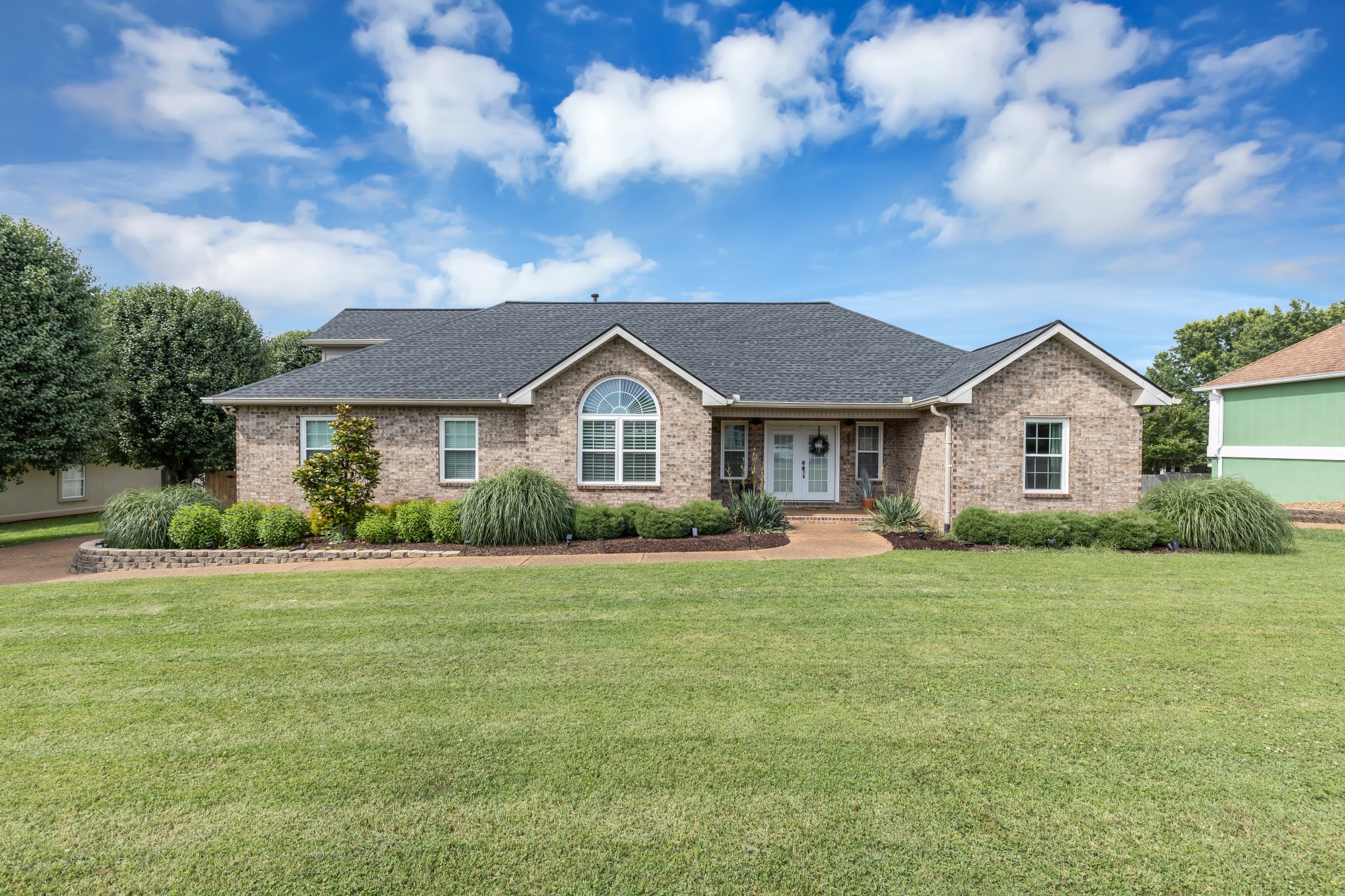 1213 Hunters Point Lane Spring Hill, TN 37174 - Photo 1 of 30 a front view of house with yard and green space