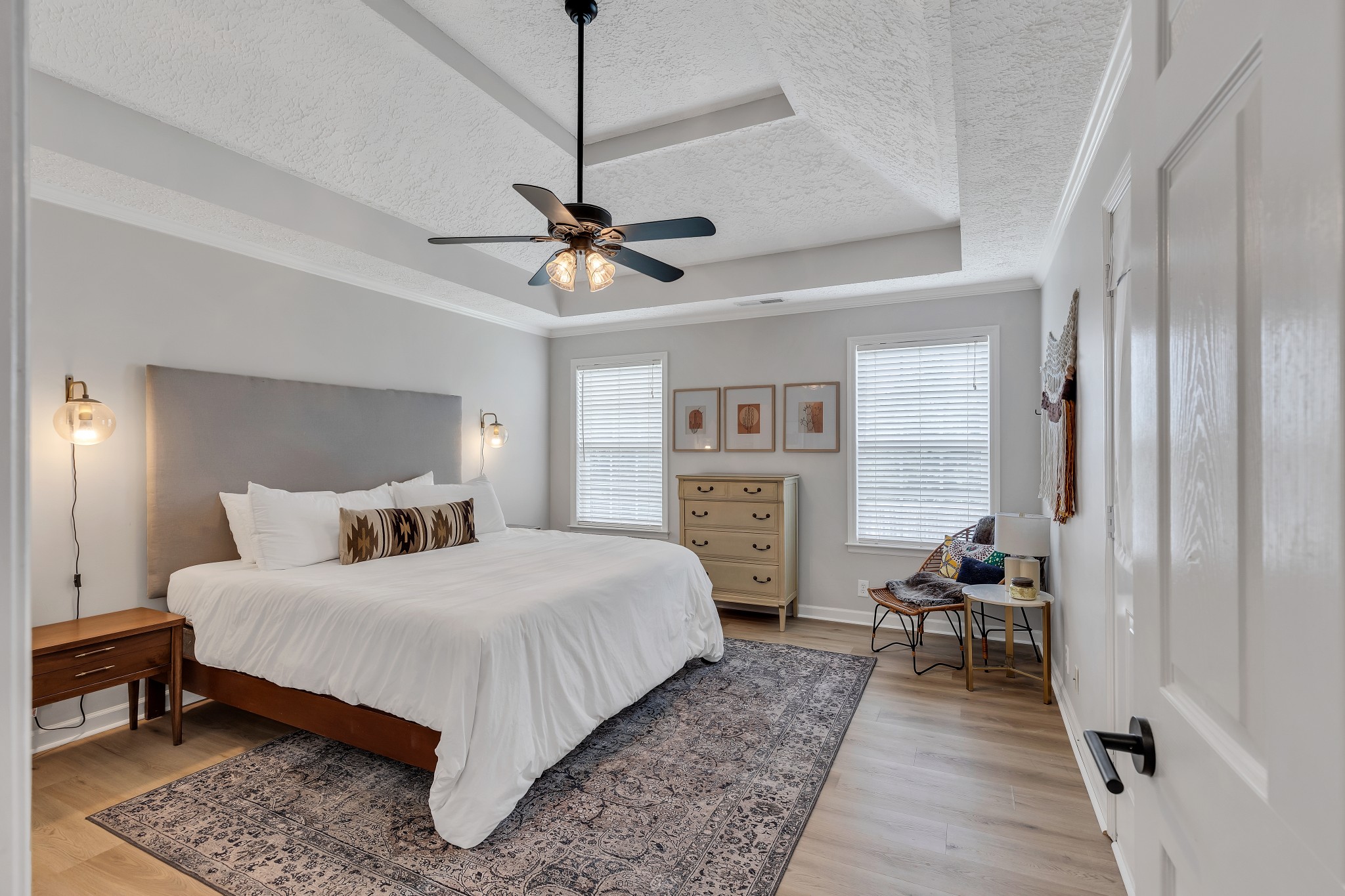 1213 Hunters Point Lane Spring Hill, TN 37174 - Photo 14 of 30 a bedroom with a large bed and a chandelier