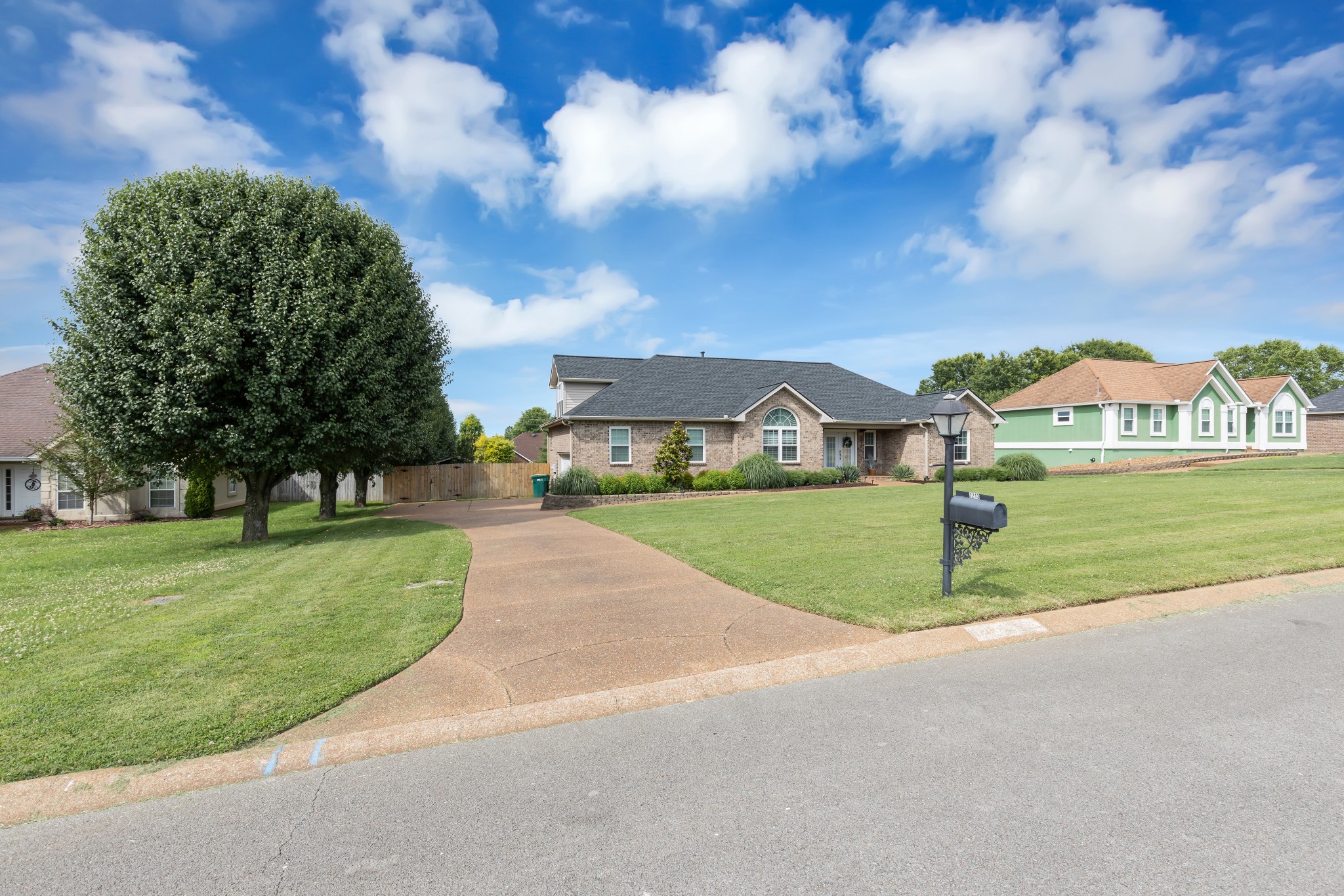 1213 Hunters Point Lane Spring Hill, TN 37174 - Photo 2 of 30 a view of green field with house in the background