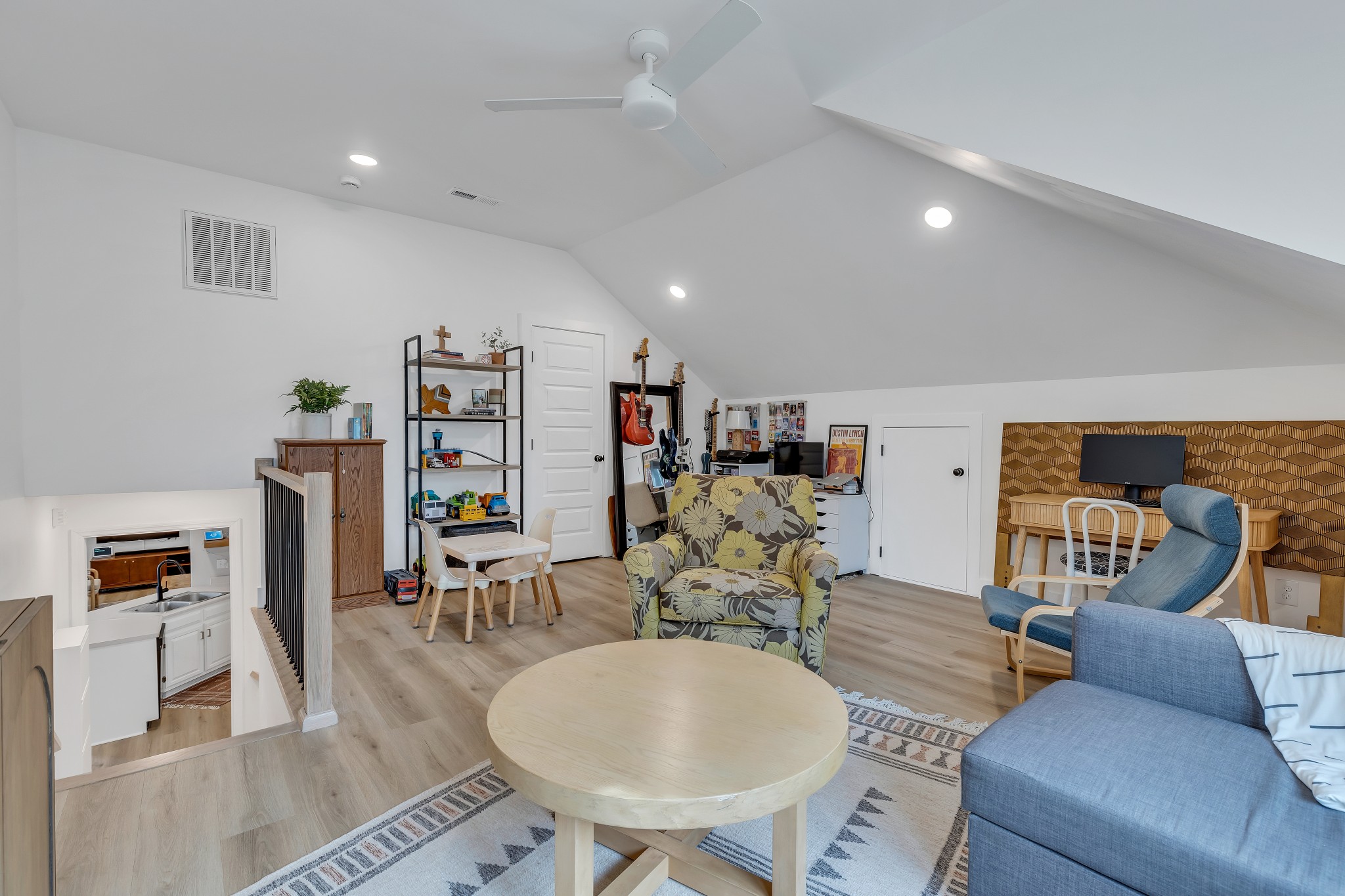 1213 Hunters Point Lane Spring Hill, TN 37174 - Photo 23 of 30 a living room with furniture and a flat screen tv