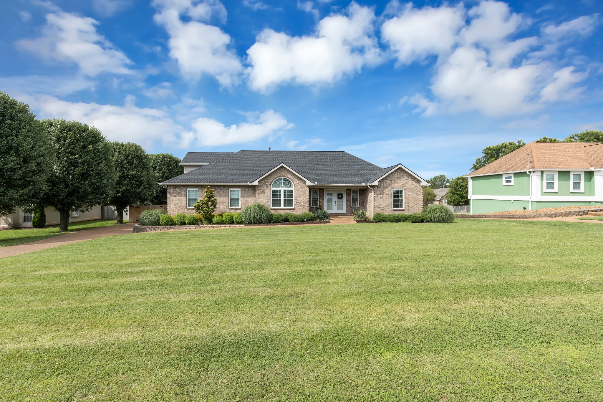 1213 Hunters Point Lane Spring Hill, TN 37174 - Photo 3 of 30 a view of house with outdoor space and swimming pool