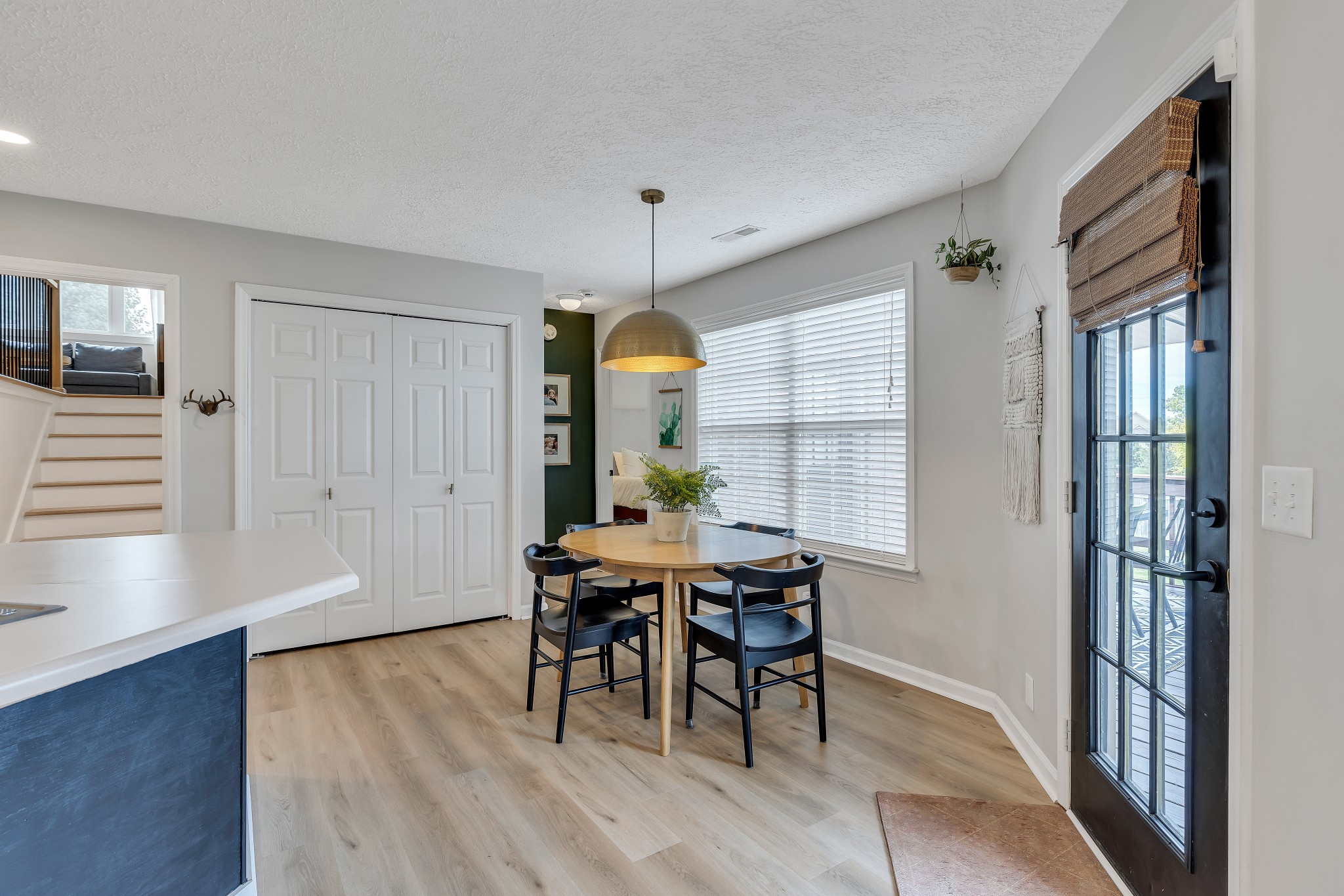 1213 Hunters Point Lane Spring Hill, TN 37174 - Photo 8 of 30 a view of a dining room with furniture window and wooden floor