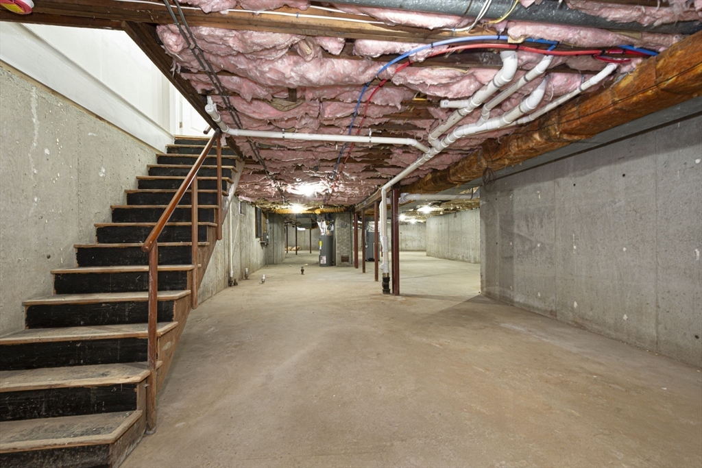 32 Aylesbury Road Worcester, MA 01609 - Photo 36 of 42 a view of an empty room with stairs