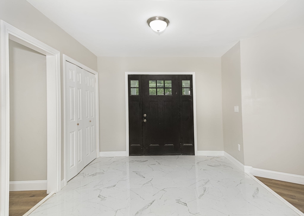 32 Aylesbury Road Worcester, MA 01609 - Photo 5 of 42 an empty room with closet and a bathroom