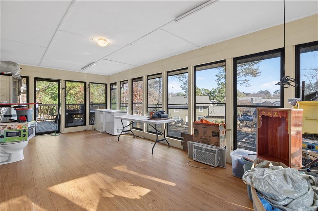 6728 Angels Lane Tucker, GA 30084 - Photo 14 of 54 a living room with furniture and large windows