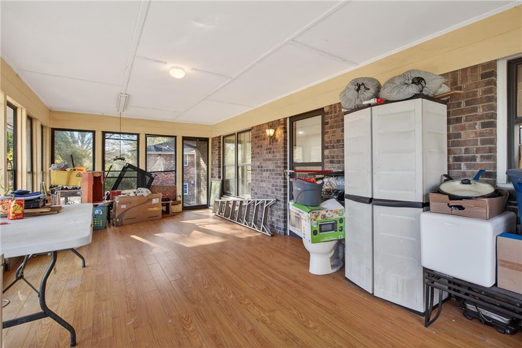 6728 Angels Lane Tucker, GA 30084 - Photo 15 of 54 a living room with furniture and a table