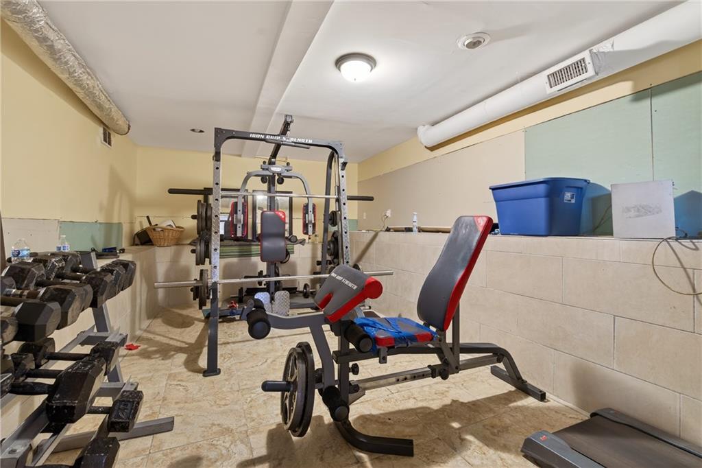 6728 Angels Lane Tucker, GA 30084 - Photo 21 of 54 a view of a room with gym equipment