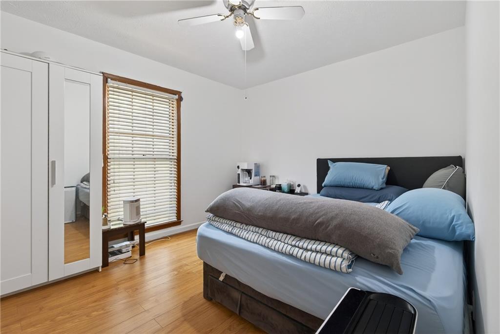 6728 Angels Lane Tucker, GA 30084 - Photo 23 of 54 a living room with a couch and a window