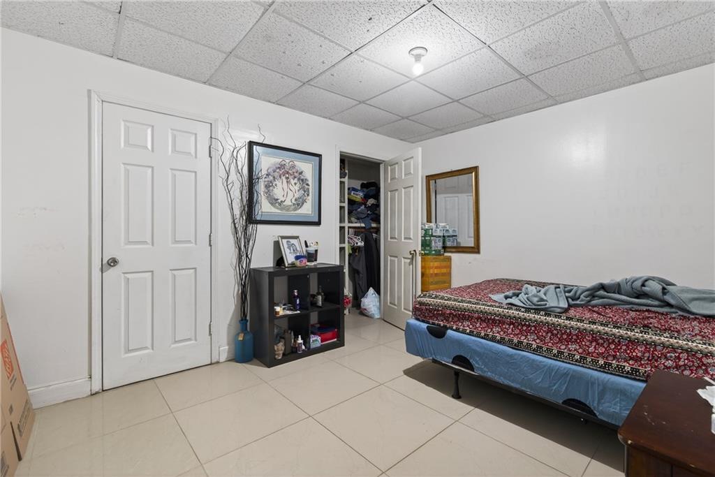 6728 Angels Lane Tucker, GA 30084 - Photo 29 of 54 a bedroom with bed and window