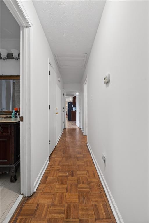 6728 Angels Lane Tucker, GA 30084 - Photo 35 of 54 a view of a hallway with wooden floor and closet