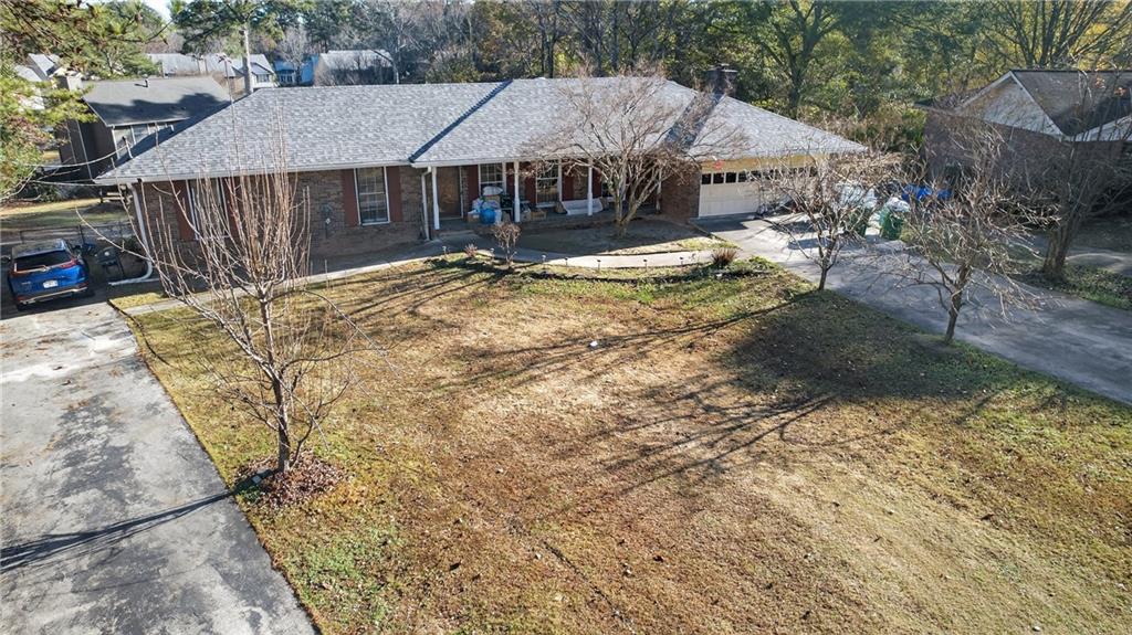6728 Angels Lane Tucker, GA 30084 - Photo 42 of 54 a view of a house with a yard