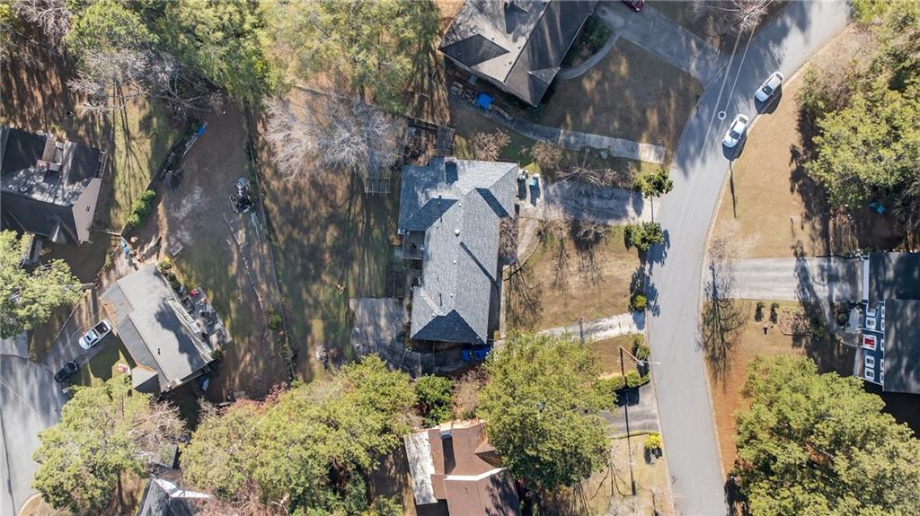 6728 Angels Lane Tucker, GA 30084 - Photo 43 of 54 an aerial view of residential houses with outdoor space