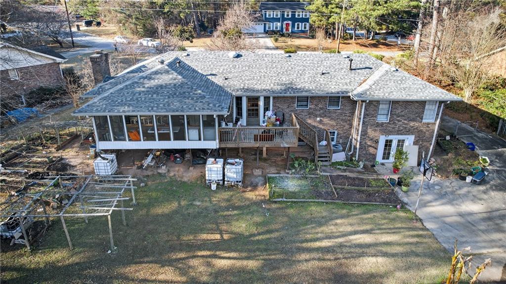 6728 Angels Lane Tucker, GA 30084 - Photo 48 of 54 a aerial view of a house with a yard