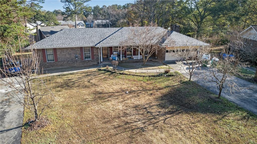 6728 Angels Lane Tucker, GA 30084 - Photo 49 of 54 a aerial view of a house with garden