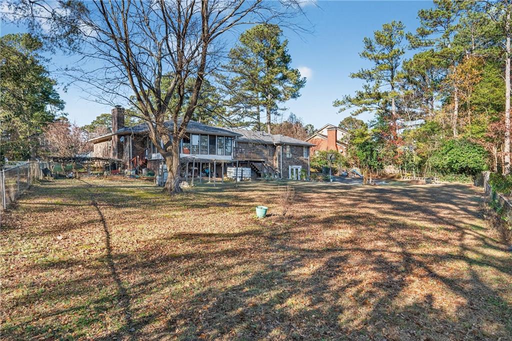 6728 Angels Lane Tucker, GA 30084 - Photo 54 of 54 a house view with pool in front of house