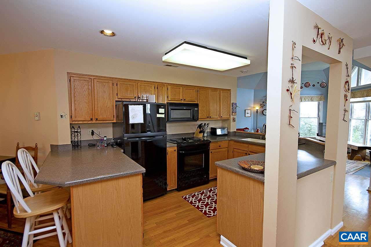23 Shenandoah Ridge Roseland, VA 22967 - Photo 9 of 26 Large kitchen with updated appliances and corian counter tops.