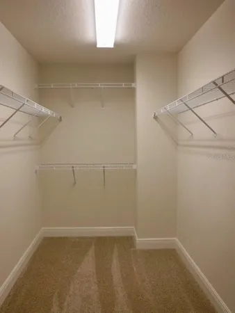 a view of a room with racks on the wall