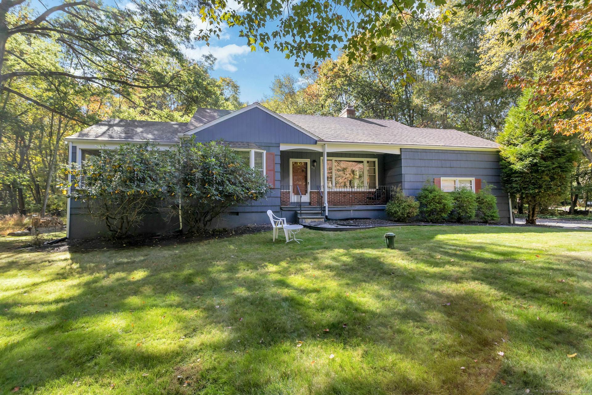 494 Westover Road Stamford, CT 06902 - Photo 1 of 1 a view of a house with a swimming pool