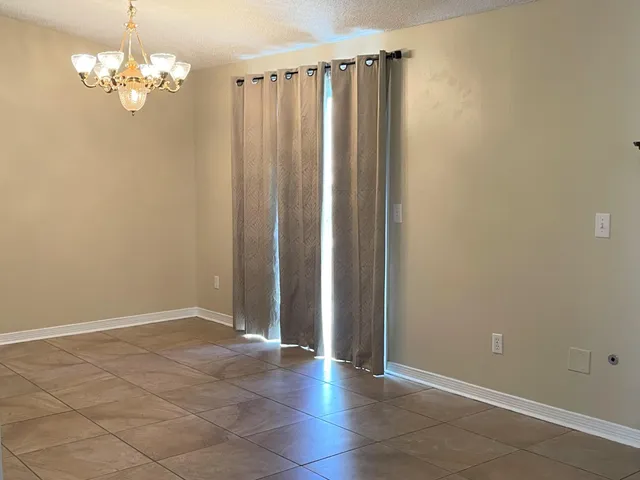 a view of a chandelier in a room