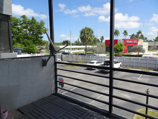 a bathroom with a toilet and bathtub