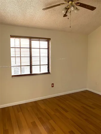 a kitchen with a sink and a window