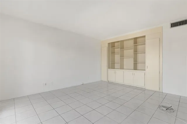 a bathroom with a sink toilet and mirror