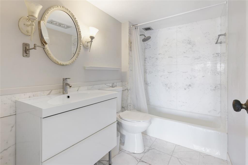 2500 East Las Olas Boulevard, Unit 406 Fort Lauderdale, FL 33301 - Photo 20 of 29 a bathroom with a sink toilet and shower