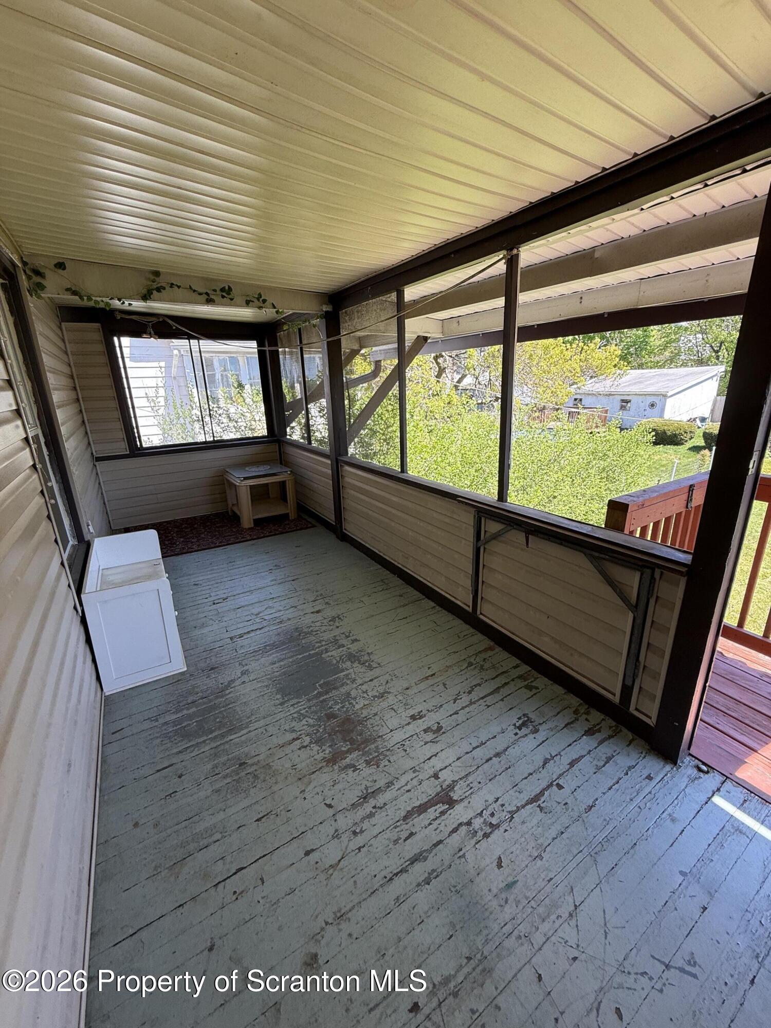 1042 Taylor Avenue, Unit 2 Scranton, PA 18510 - Photo 13 of 14 a view of an empty room with a window