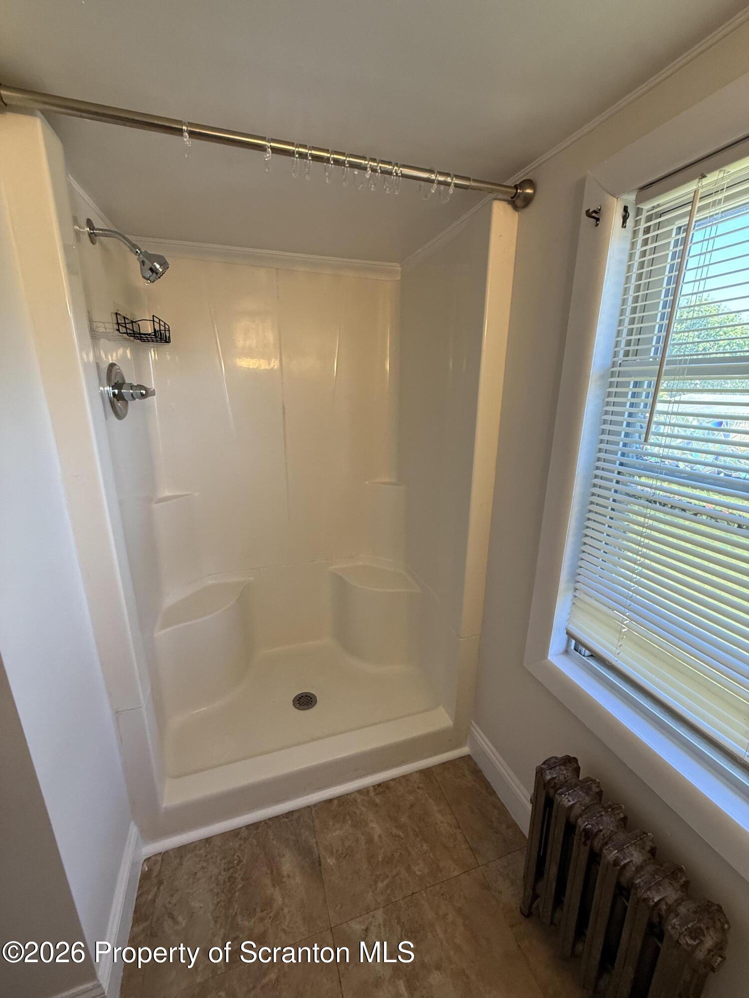 1042 Taylor Avenue, Unit 2 Scranton, PA 18510 - Photo 7 of 14 a bathroom with a shower
