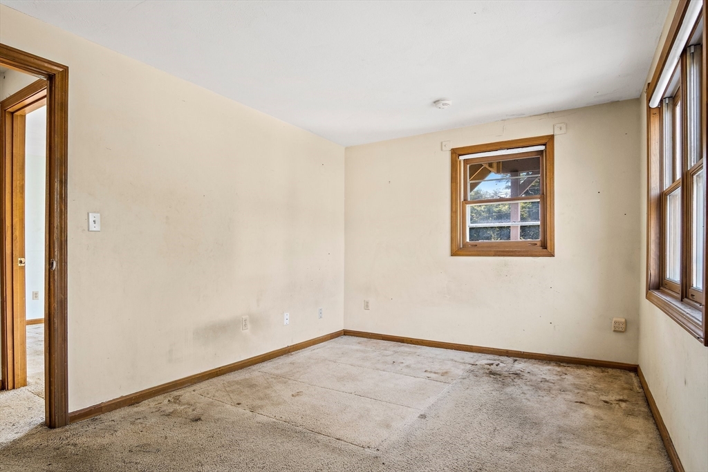 30 Angle Street, Unit 1 Lowell, MA 01851 - Photo 12 of 20 an empty room with windows