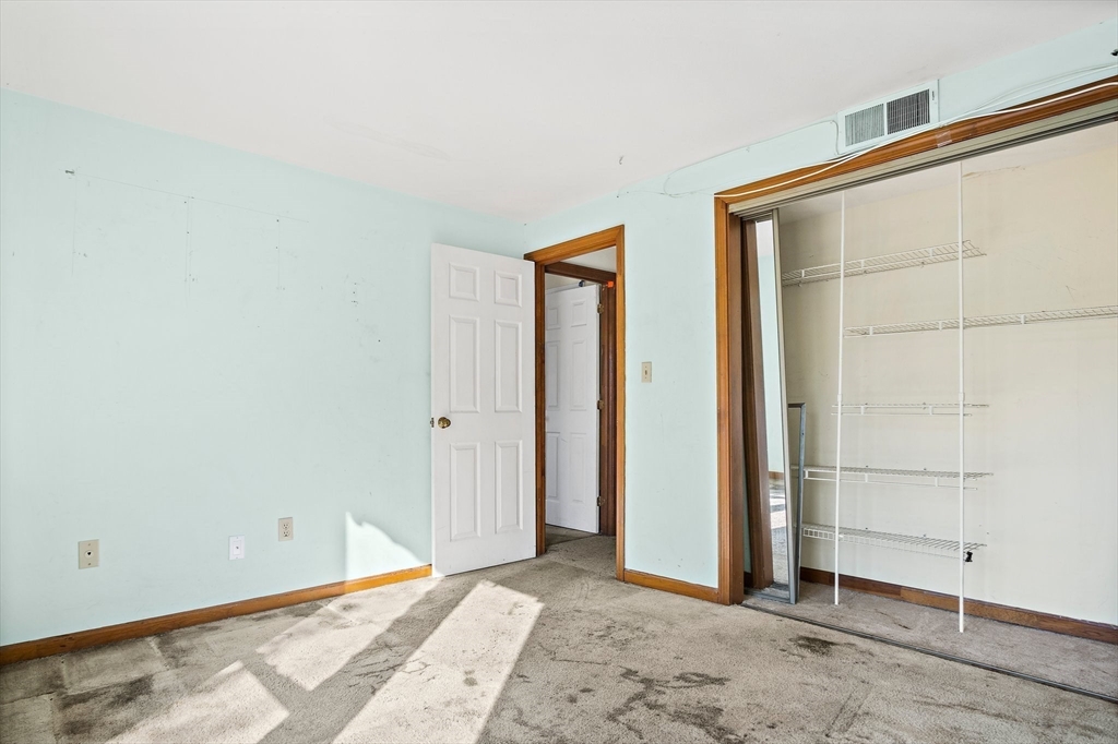 30 Angle Street, Unit 1 Lowell, MA 01851 - Photo 14 of 20 an empty room with window